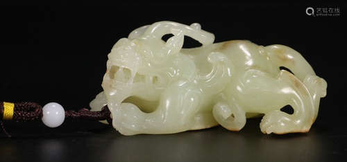 A HETIAN JADE CARVED AUSPICIOUS BEAST