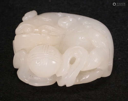 A HETIAN JADE CARVED LION