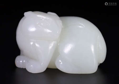 A HETIAN JADE CARVED AUSPICIOUS BEAST