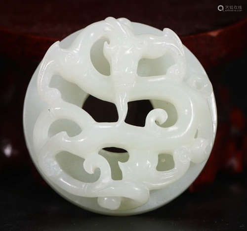 A HETIAN JADE BI CARVED WITH DRAGON