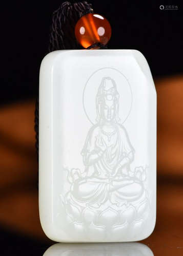 A HETIAN JADE CARVED GUANYIN BUDDHA WITH LOTUS