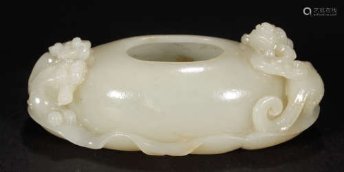 A HETIAN JADE BRUSH WASHER CARVED WITH AUSPICIOUS BEAST