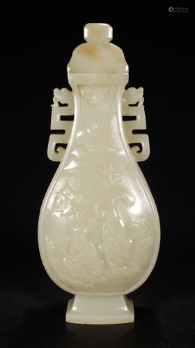 A HETIAN JADE VASE CARVED WITH STORY PATTERN