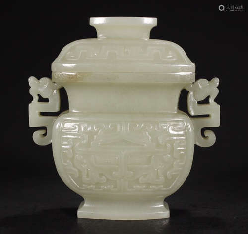 A HETIAN JADE VASE CARVED WITH BEAST PATTERN