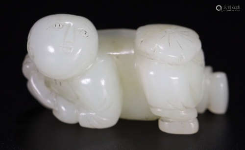 A HETIAN JADE CARVED FIGURE