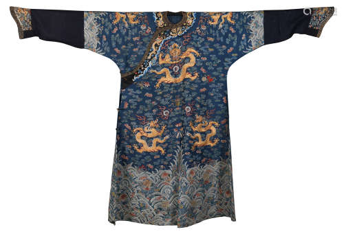 A CHINESE BLUE GROUND BROCADE AND EMBROIDERED SILK ROBE