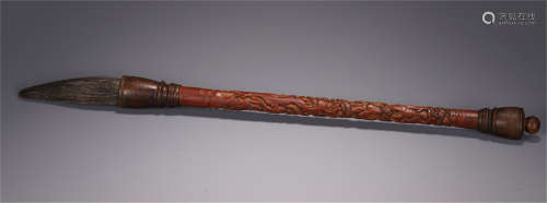 A CHINESE CARVED FIGURE AND STORY BAMBOO HANDLE BRUSH