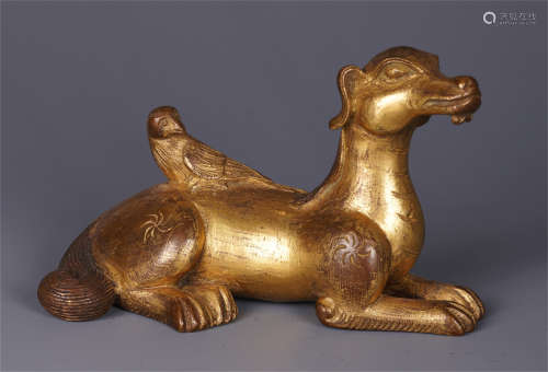 A CHINESE GILT BRONZE AUSPICIOUS BEAST AND BIRD TABLE ITEM