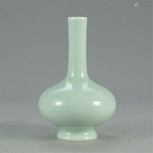 A CHINESE PEA GREEN PORCELAIN TIANQIU VASE