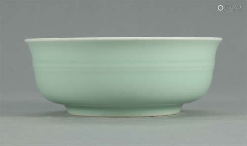 A CHINESE PORCELAIN PEA GREEN BOWL