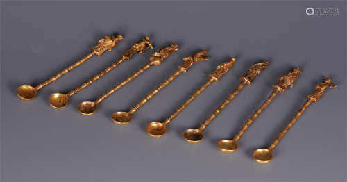 SET OF CHINESE GILT BRONZE EIGHT IMMORTALS HANDLE SPOONS