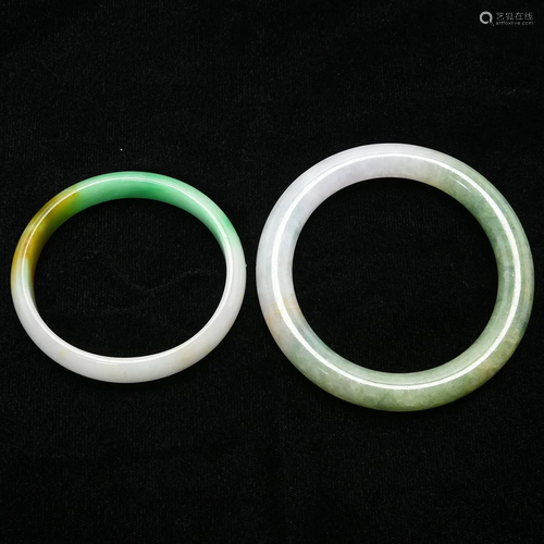 Group of Two Jade and Jadeite Bangle Bracelets.