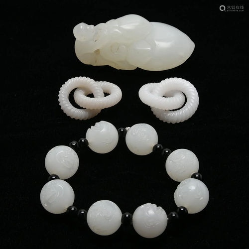 Group of Four Carved white Jade Items.