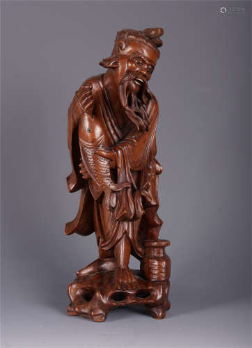 A CHINESE CARVED BUMPER HARVEST TU BOXWOOD ELDER WITH FISH TABLE ITEM