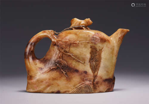 A CHINESE CARVED PLUM SHOUSHAN STONE KETTLE