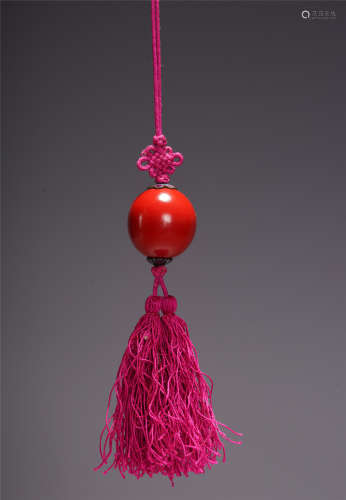 A CHINESE LACQUERWARE BEAD HANGING ITEM