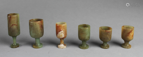 A Group of Six Carved Jade Wine Cups