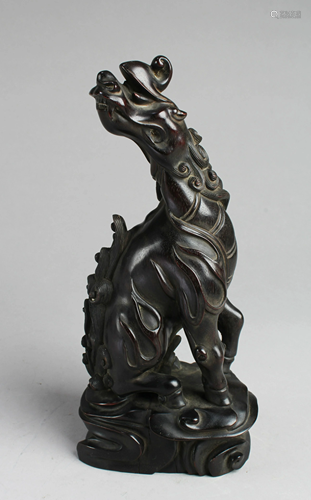 A Carved Zitan Mythical Beast Statue