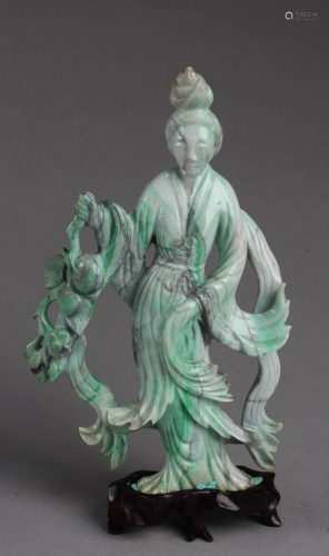 A Carved Jade Figurine
