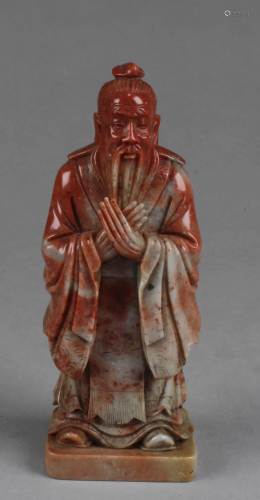A Carved Soapstone Deity Figurine