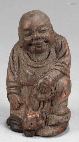 A Wooden Carved Monk Statue