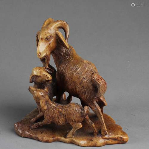 A Carved Stone Goat Figurine