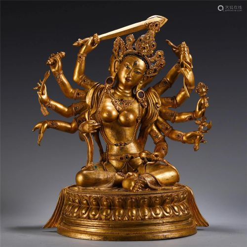 CHINESE GILT BRONZE EIGHT ARM SEATED GUANYIN