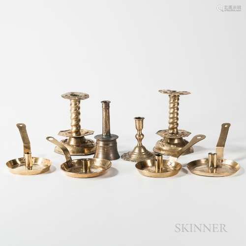 Eight Brass Candlesticks