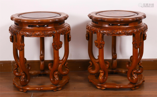 A PAIR OF CHINESE HARDWOOD CARVED ROUN…