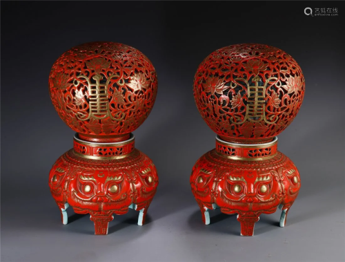 A PAIR OF CHINESE CARVED OPENWORK GILT-DE…