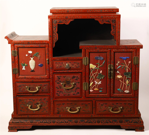 A RARE AND UNUSUAL CHINESE RED LACQUER CABI…