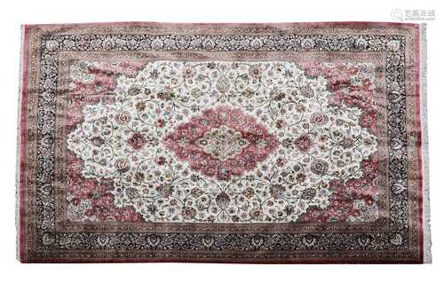 A fine Persian silk Qom rug,