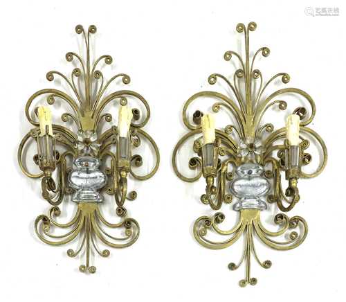 A pair of scrolled metal and glass twin-branch wall lights,