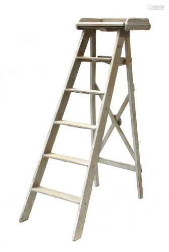 A French-style grey painted stepladder,