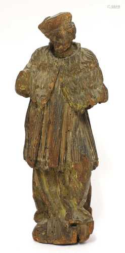 A Bohemian carved pine religious figure of St John of Nepomuk,