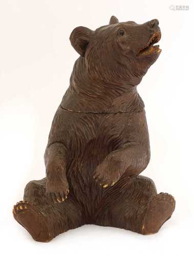 A Black Forest seated bear,