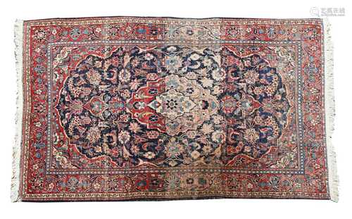 A Persian blue ground rug,