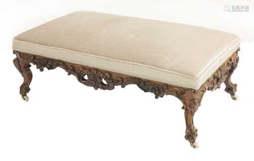 A large Victorian rosewood footstool,