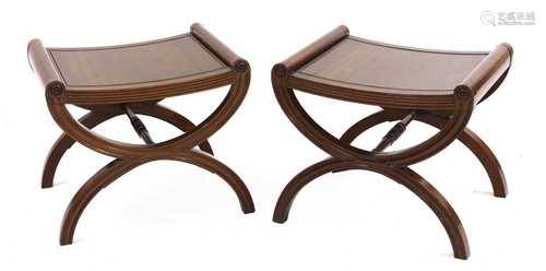 A pair of mahogany 'X' framed stools,