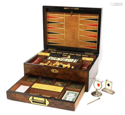 A Victorian walnut games compendium,