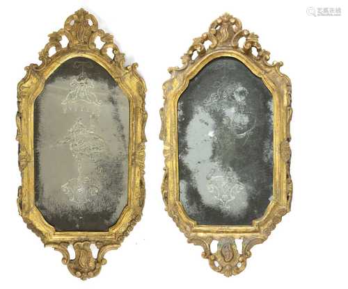 A pair of Venetian giltwood girandole wall mirrors,