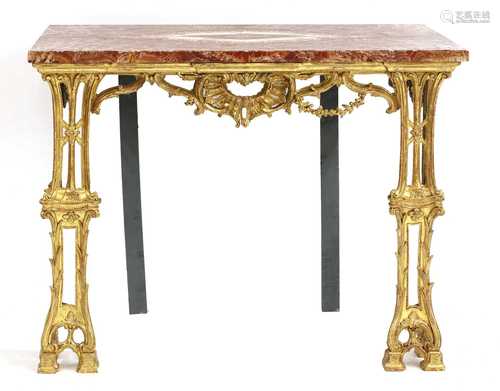 A carved giltwood console table,