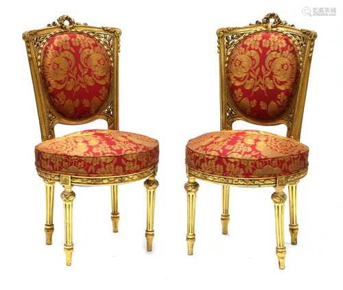 A pair of French Louis XVI-style giltwood salon chairs,