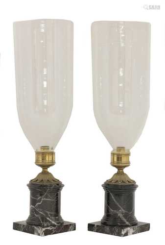 A pair of hurricane lamps