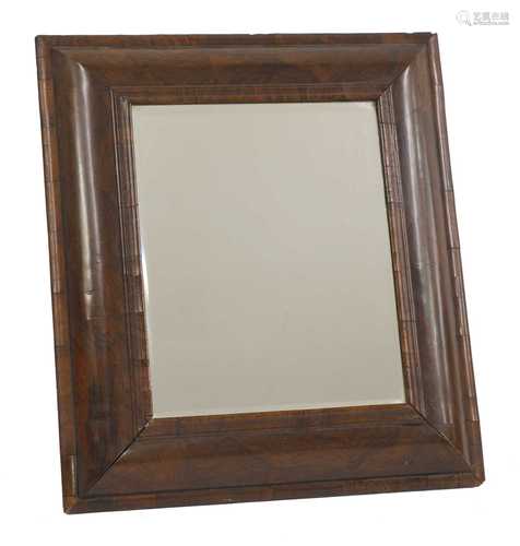 A William and Mary cushion-framed walnut-veneered mirror,