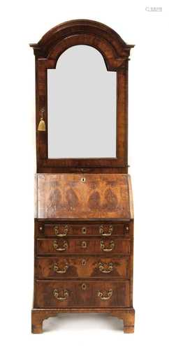 A George I walnut dome top bureau cabinet,