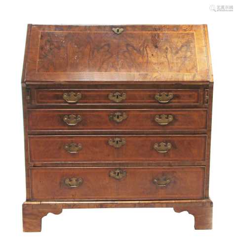 A George III walnut and feather banded bureau,