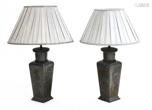 A pair of Chinese pewter vase lamps and shades,