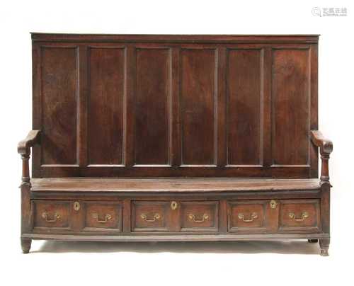 An oak settle,