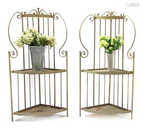 A pair of painted ironwork orangery corner plant stands,